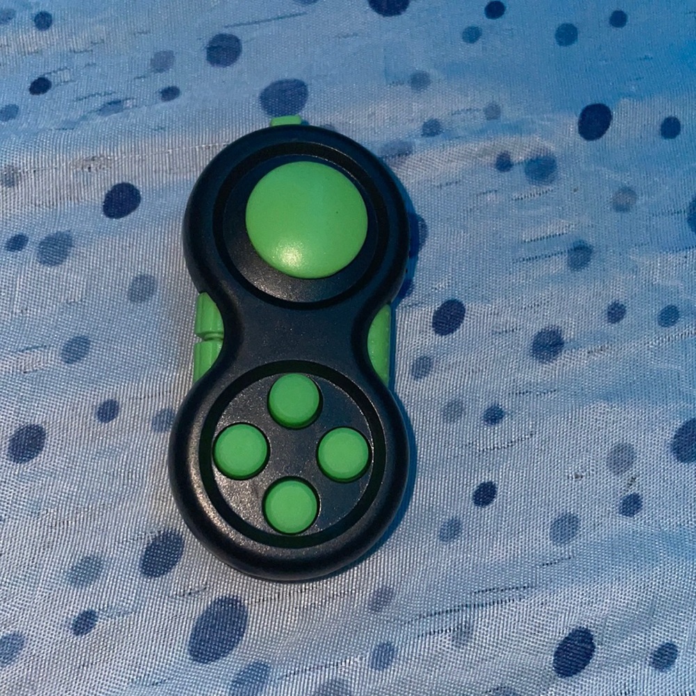 Green and black fidget pad